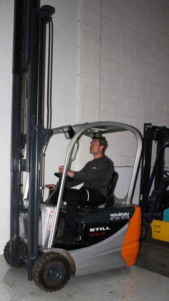 CARRETILLA STILL GRIS Y NARANJA